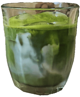 A glass of the signature Matcha Latte, served with ice.